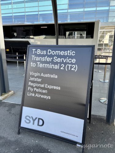 Shuttle bus sign at Sydney International Airport